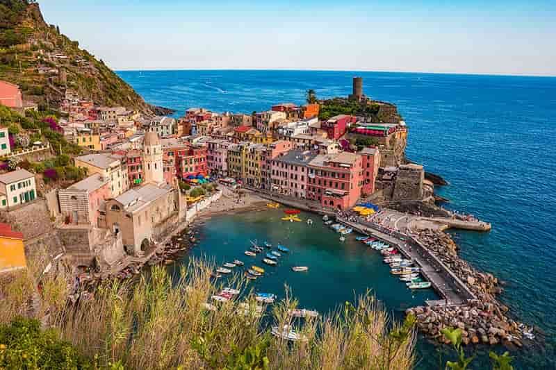 Vibrant Vernazza: Cinque Terre's gem of pastel houses and coastal charm.